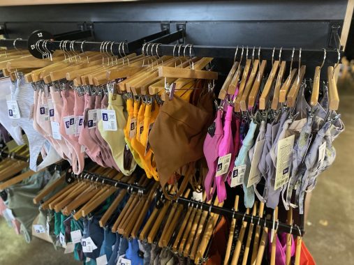 Two racks of sports bras at the lululemon outlet shopping in Melbourne