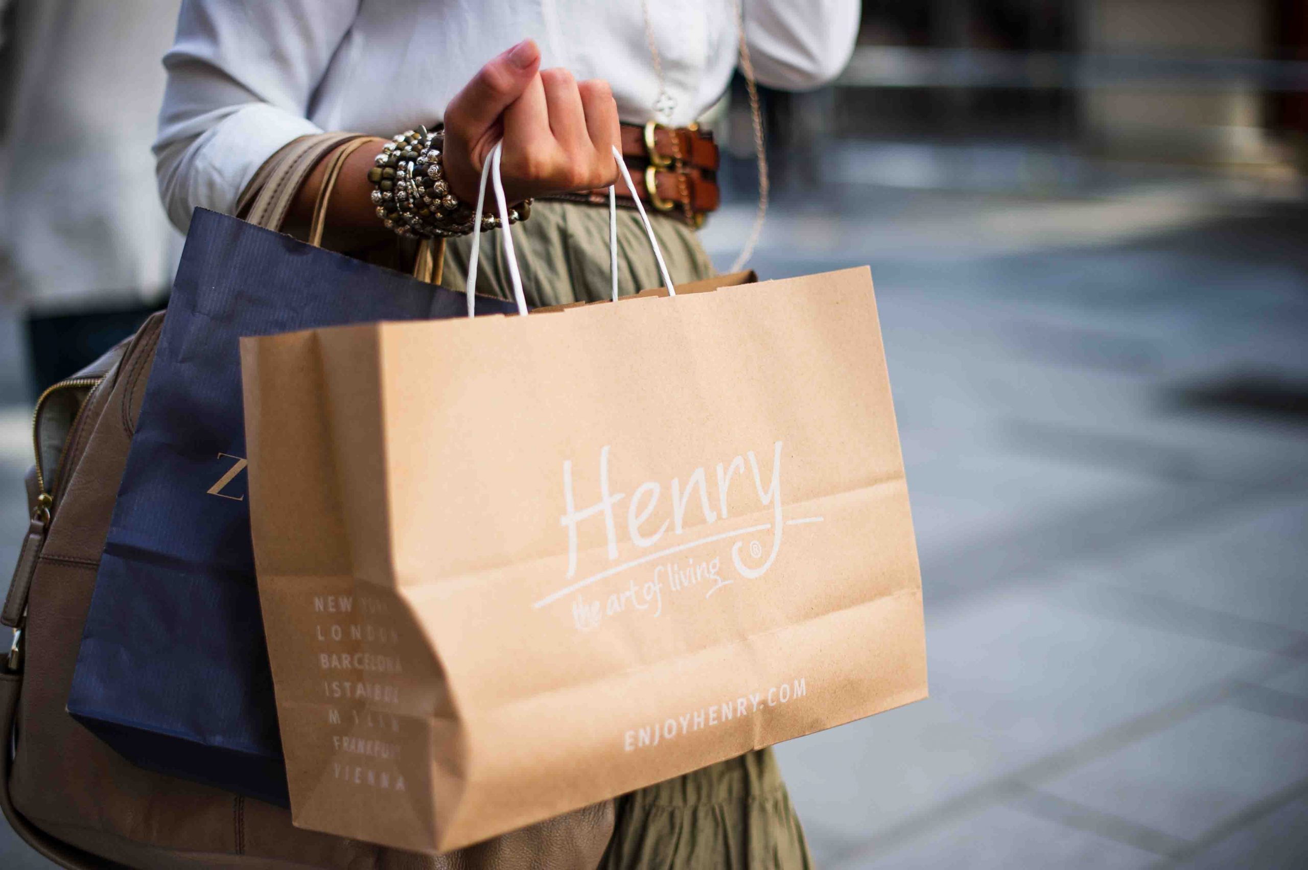 Woman holding bags from a spree at some of the best outlet shopping in Melbourne