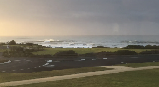 Picture of Great Ocean Road and the waves crashing in the distance, which is the view from this Torquay Airbnb accommodation