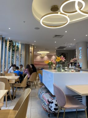 Picture of the cafe decor at Sulbing Premium Cafe, with LED lights on the ceiling and decorative chairs