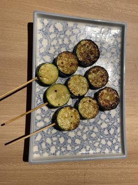 Picture of grilled zucchini on a blue and white dish, a grilled starter from Yakikami South Yarra