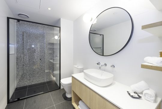 Picture of the white and black bathroom at R Hotel Geelong accommodation