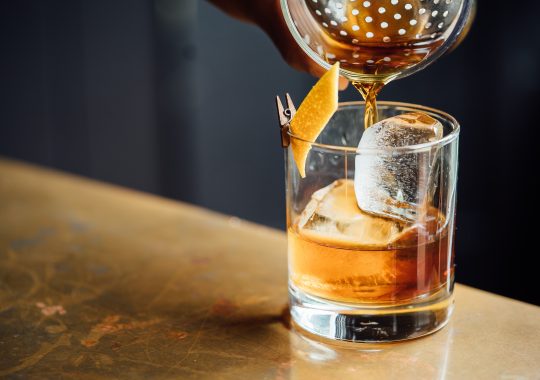 Picture of a flay-lay of a whiskey and Father's Day menu spread at Archer's Marriott Docklands