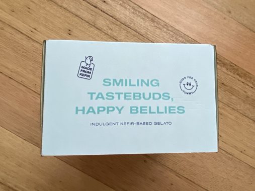 Picture of Good Vibes vegan ice cream with the words 'smiling tastebuds, happy bellies' written on the side of the vegan ice cream box