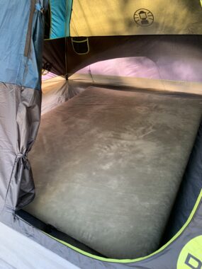 Picture of the Wanderer queen matress lying in a tent as it self inflates