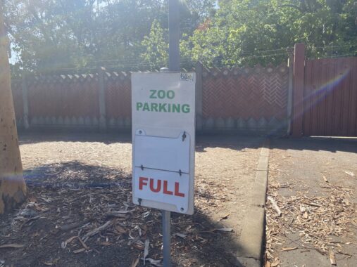 Picture of a sign that says Melbourne Zoo parking full, taken on a busy public holidays