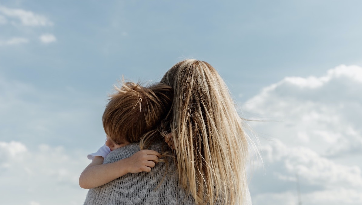 Picture of a mother and a child hugging on a Mother's Day Melbourne day out