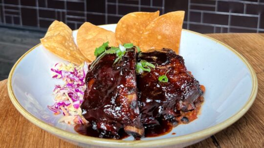 Picture of pork ribs and tortillas in a bowl at The Boatbuilders Yard restaurant