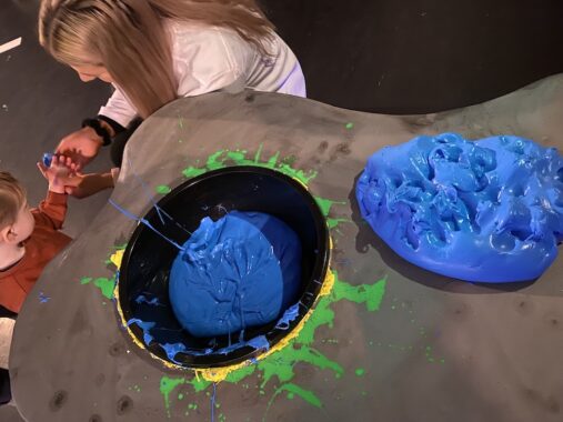 Chaos Lab Melbourne photos that show two big balls of blue slime that children can play with