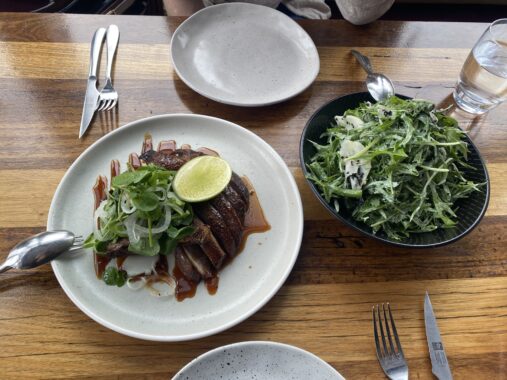 Picture of the duck and green salad from Taxi Kitchen Melbourne at Fed Square