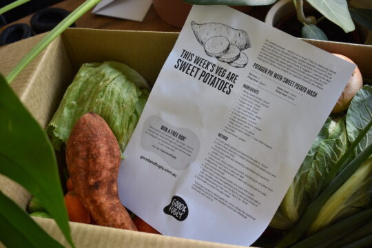 Picture of a Good and Fugly vegetable box with a Sweet Potato recipe on top of the vegetable box