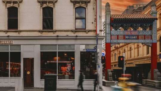 Kweichow Moutai boutique in Melbourne's Chinatown with a sunset sky