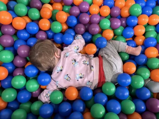 Picture of a child playing in ball pit at a play centre in Melbourne