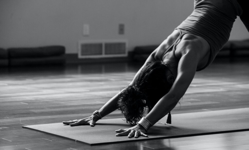 Picture of a woman doing wellness yoga in Melbourne