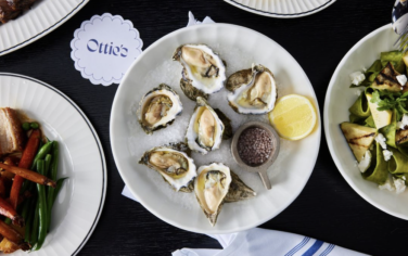 Ottie's restaurant with a plate of oysters