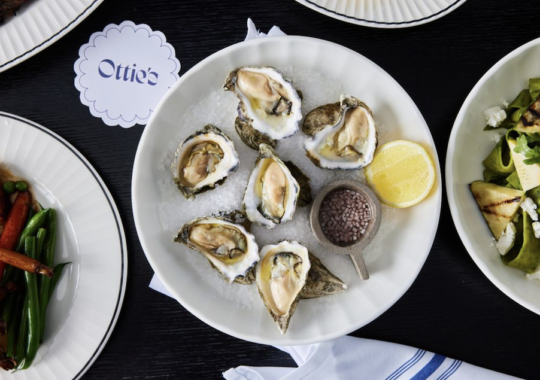 Ottie's restaurant with a plate of oysters