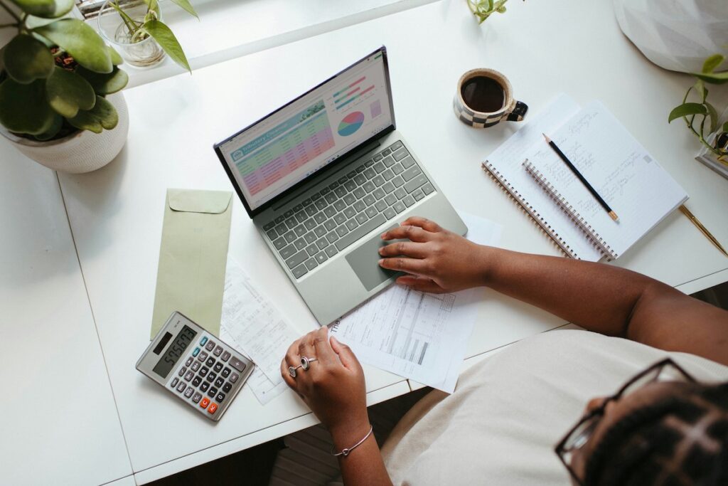 Picture of a woman working on a laptop