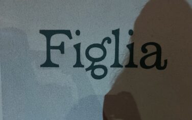 Figlia Brunswick East restaurant sign with shadows cast over the sign