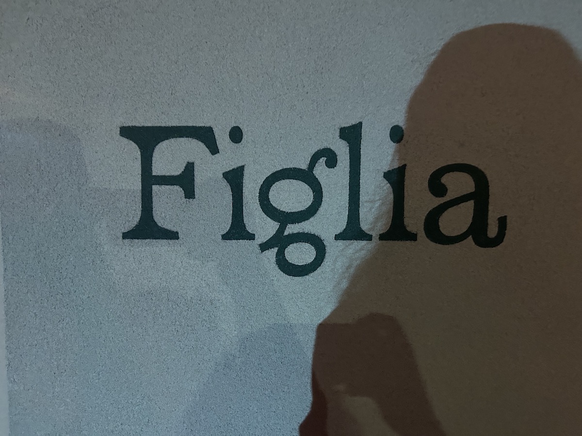 Figlia Brunswick East restaurant sign with shadows cast over the sign